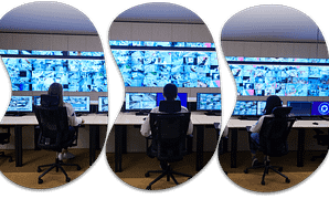 Illustration of a logistics control center with multiple monitors displaying a Transportation Management System (TMS) for the trucking industry, showcasing route optimization, real-time tracking, and performance metrics, representing the ultimate guide to TMS for efficient and streamlined transportation operations.